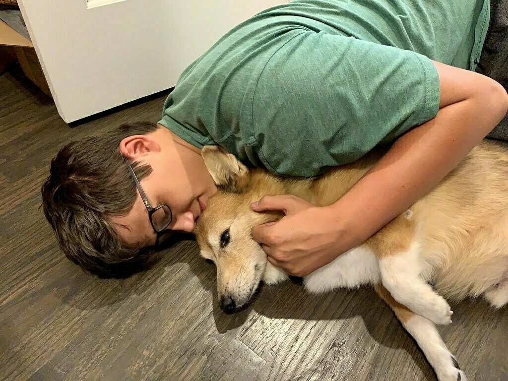 A boy and his dog. A dog and his boy.