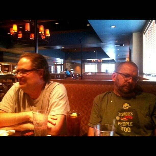 Proof that @tapbot_paul (left) does leave his hermit hole. @agiletortoise checking live blog of iPad mini announcement.